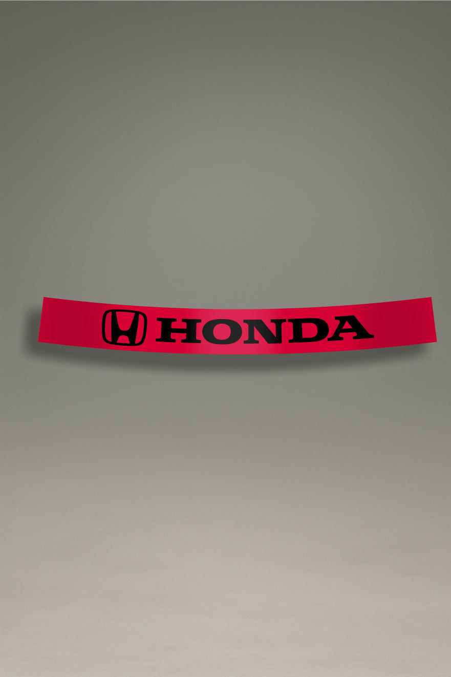 Parasol de vinilo rojo con el logotipo oficial de Honda en negro. Un accesorio de estilo deportivo de MOA-Grafics para proteger y personalizar tu vehículo.