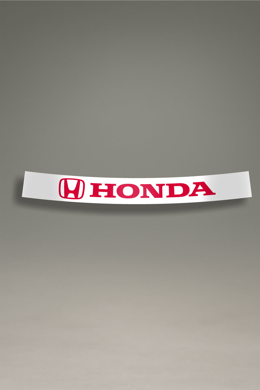 Parasol de vinilo blanco con el logotipo oficial de Honda en rojo. Un accesorio de MOA-Grafics para proteger el vehículo del sol con un diseño deportivo.