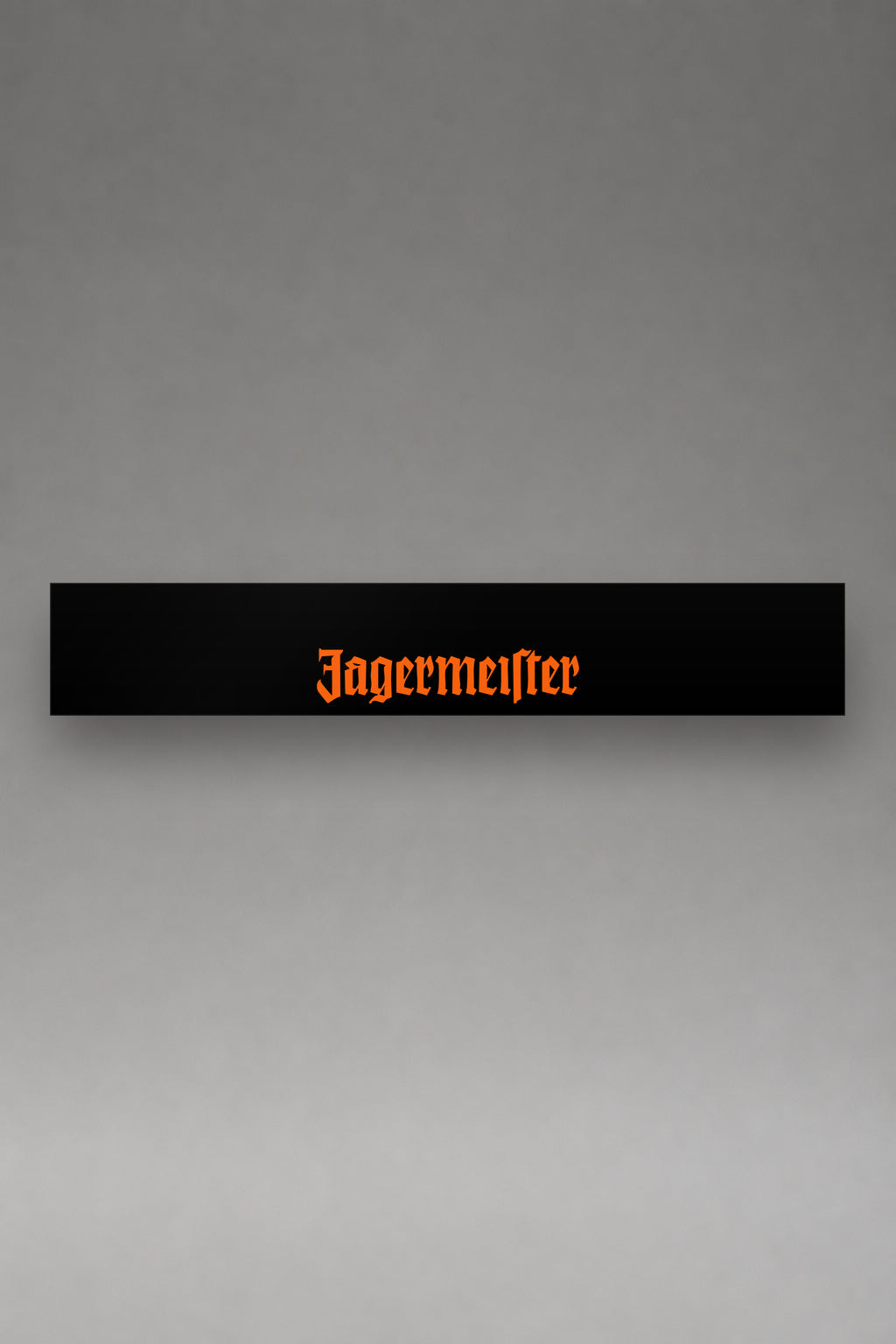 Parasol de vinilo Jägermeister · Naranja de Competición, la tira entera de 150 x 25 cm vista de frente, de MOA-Grafics.