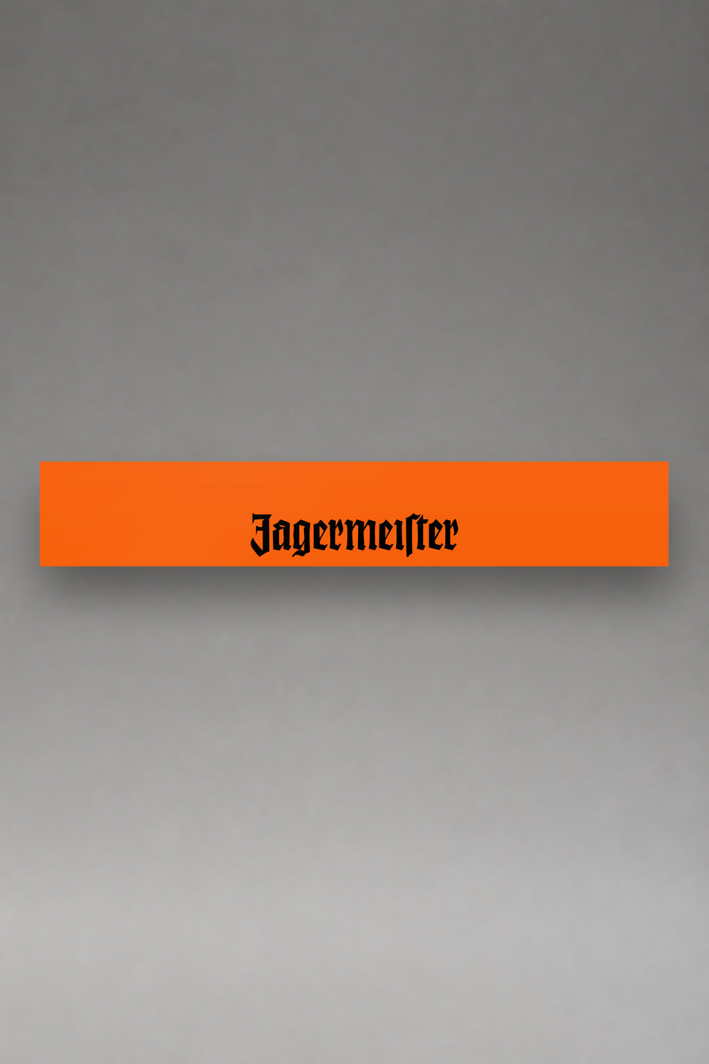 Parasol de vinilo Jägermeister · Naranja de Competición, la tira entera de 150 x 25 cm vista de frente, de MOA-Grafics.