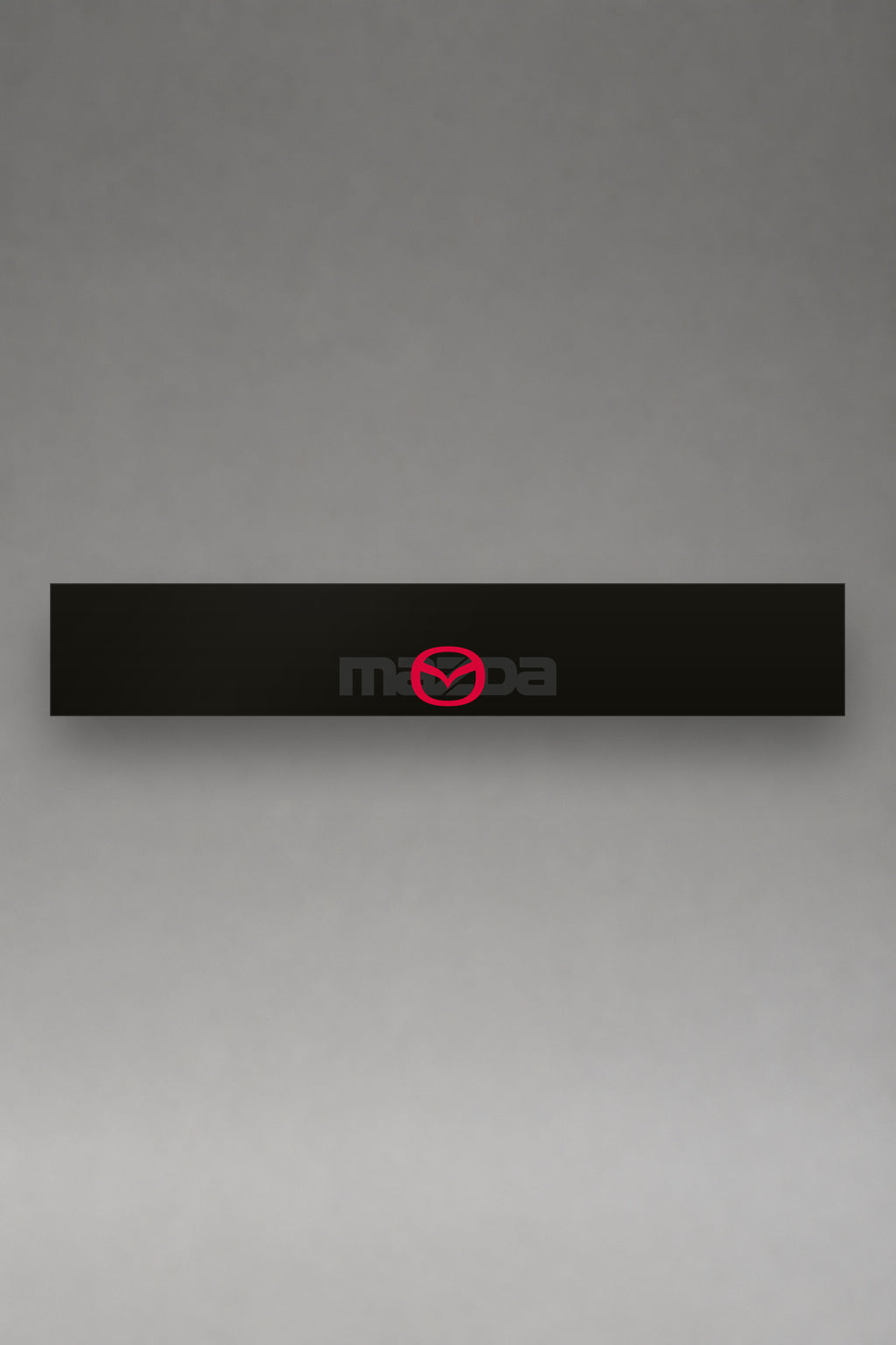 Parasol de vinilo Mazda · Logo Edición Underground, la tira entera de 150 x 25 cm vista de frente, de MOA-Grafics.