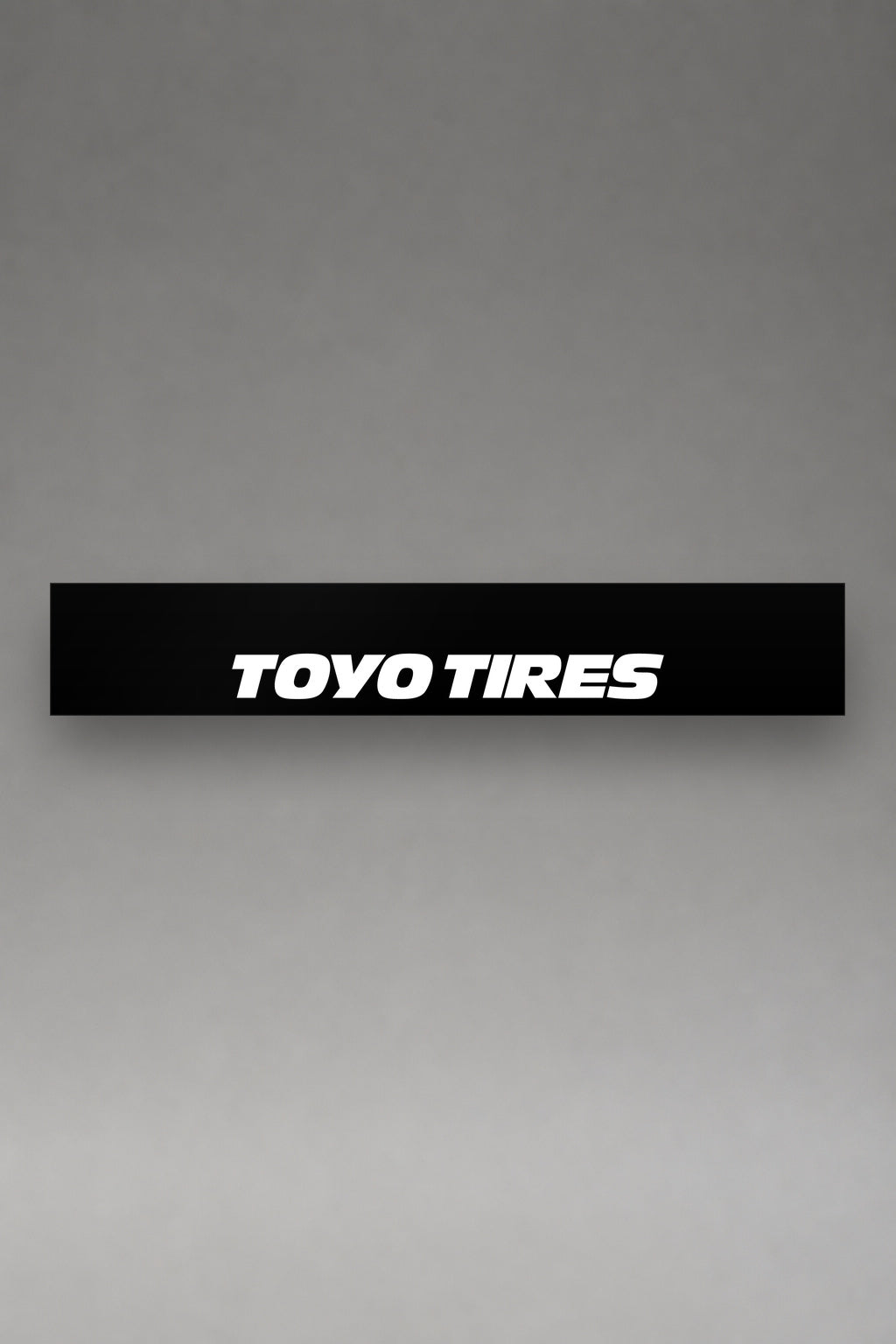 Parasol de vinilo Toyo Tires · Logo Clásico, la tira entera de 150 x 25 cm vista de frente, de MOA-Grafics.