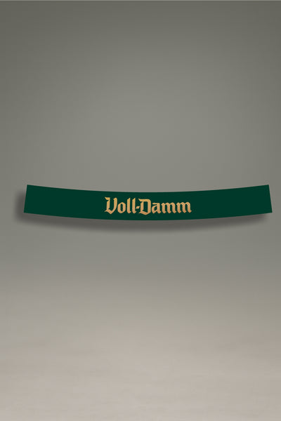 Parasol de vinilo verde con el logotipo clásico de Voll-Damm en dorado. Un accesorio de MOA-Grafics para personalizar y proteger tu vehículo con un estilo único.