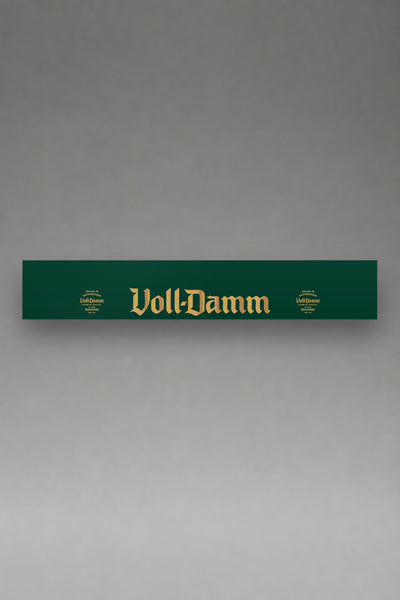 Parasol de vinilo Völl-Damm · Logotipo Deportivo, la tira entera de 150 x 25 cm vista de frente, de MOA-Grafics.
