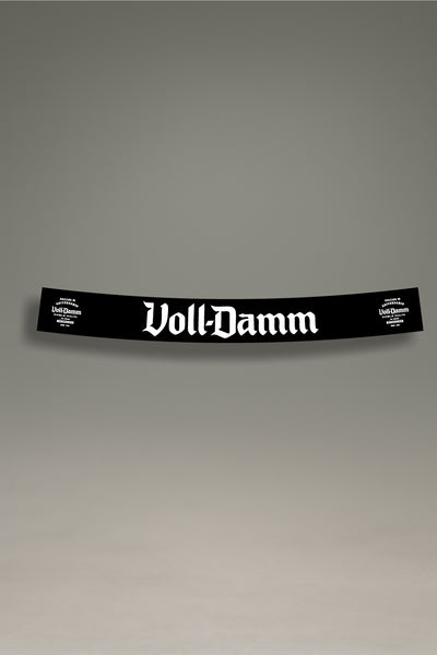Parasol de vinilo verde con el logotipo premium de Voll-Damm en blanco. Un accesorio de MOA-Grafics para proteger el interior de tu coche con un estilo clásico.