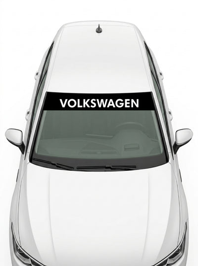 Volkswagen - Emblema y Nombre Completo negro con el lettering VOLKSWAGEN en mayúsculas blancas instalado en el parabrisas