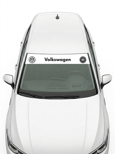 Volkswagen - Sello Wolfsburg blanco con el emblema VW, el lettering Volkswagen y el escudo de Wolfsburg en negro instalado en el parabrisas