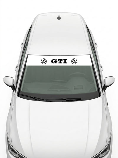 Volkswagen - Sigla y Matriz blanco con el lettering GTI en negro entre dos emblemas VW instalado en el parabrisas