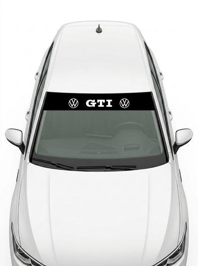 Volkswagen - Sigla y Matriz negro con el lettering GTI en blanco entre dos emblemas VW instalado en el parabrisas