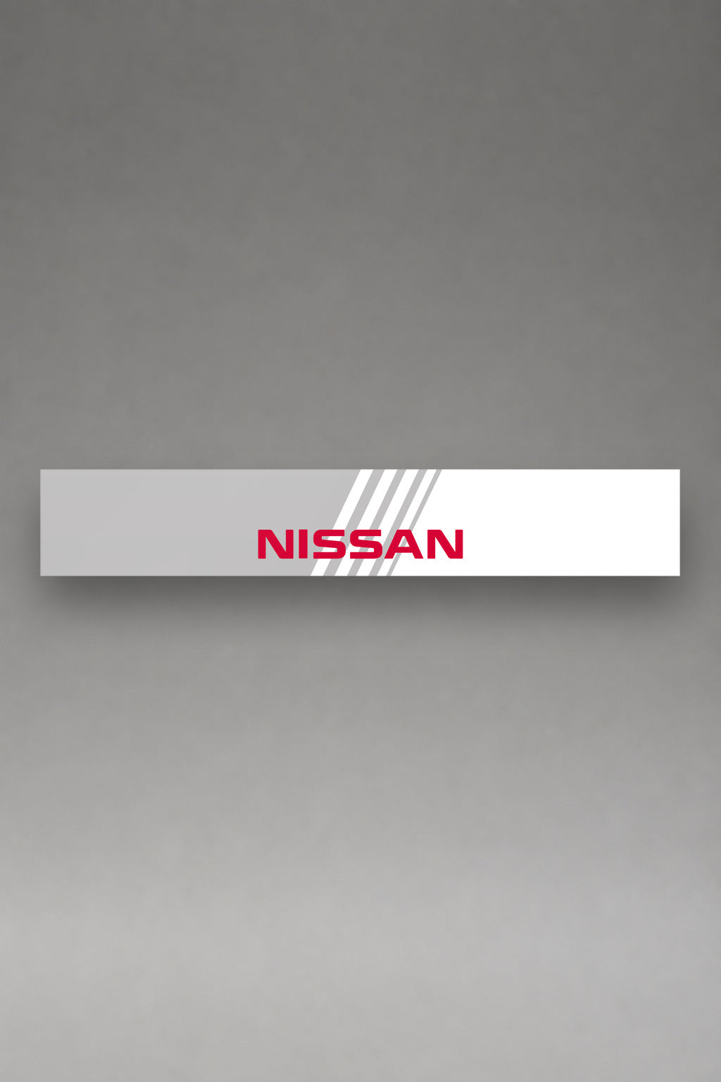 Parasol de vinilo Nissan blanco con el lettering NISSAN y las franjas grises, la tira entera vista de frente, de MOA-Grafics.