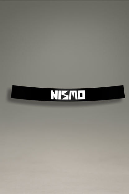 Parasol negro para parabrisas con el logo Nismo en blanco, estilo JDM para personalización y tuning de MOA-Grafics.