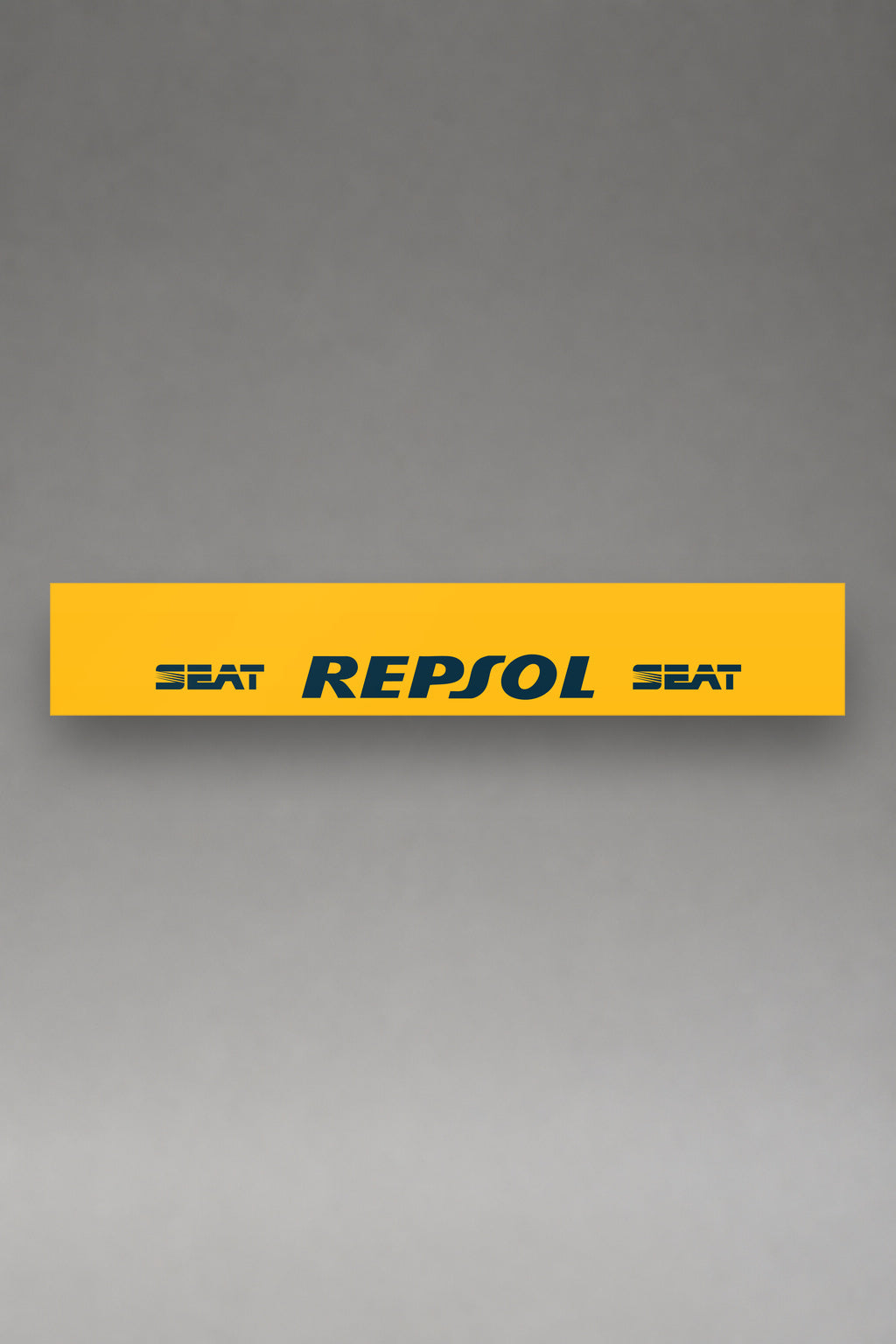 Parasol de vinilo Seat Repsol en amarillo, la tira entera de 150 x 25 cm vista de frente, de MOA-Grafics.