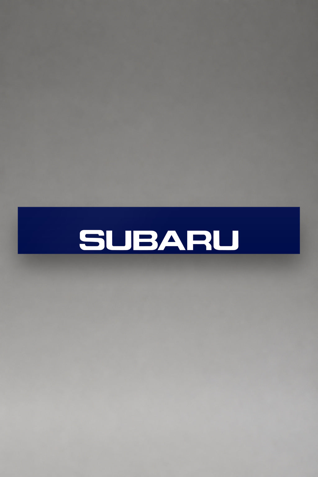 Parasol de vinilo Subaru · Identidad Contemporánea, la tira entera de 150 x 25 cm vista de frente, de MOA-Grafics.