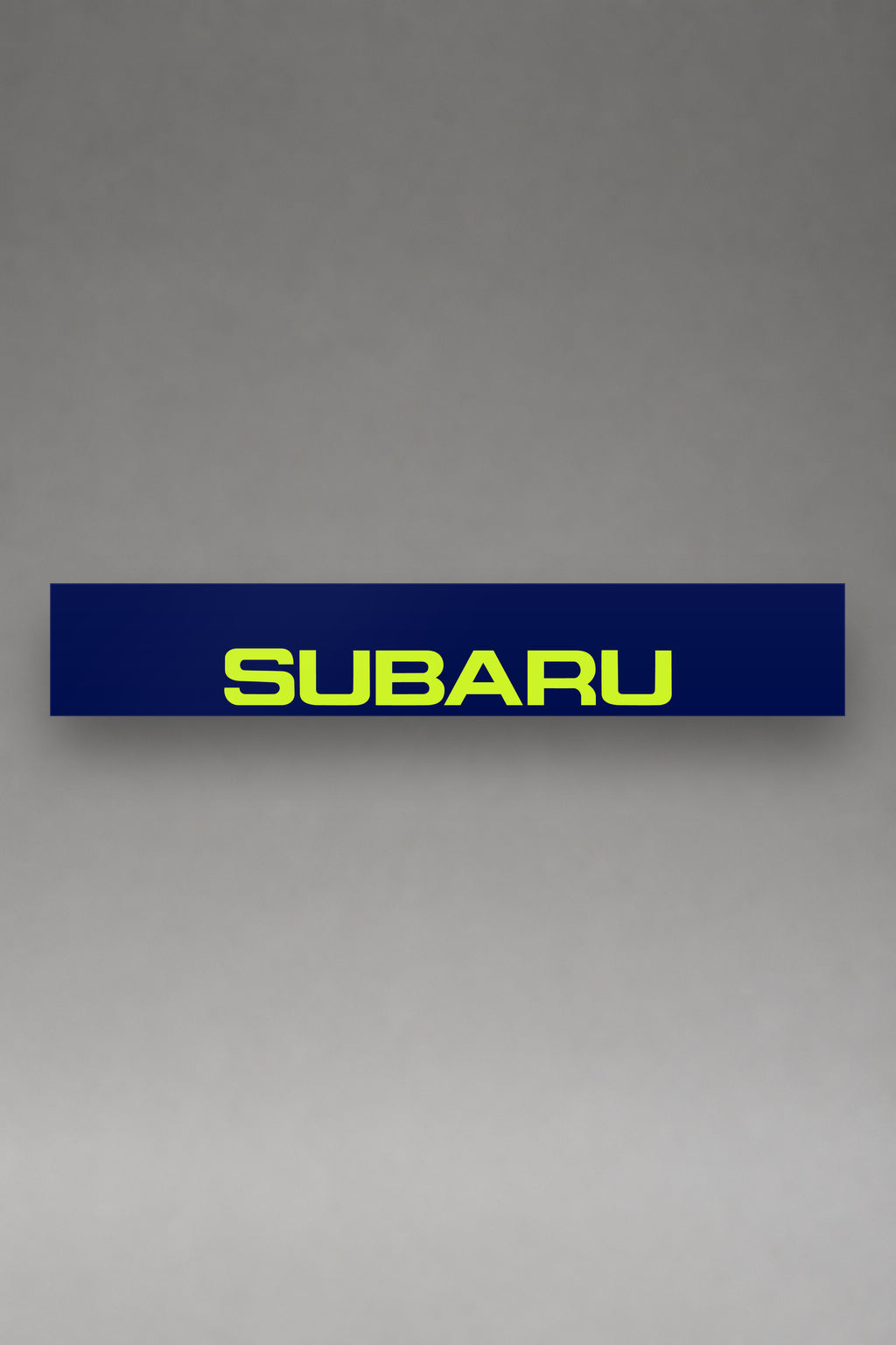 Parasol de vinilo Subaru · Identidad Contemporánea, la tira entera de 150 x 25 cm vista de frente, de MOA-Grafics.