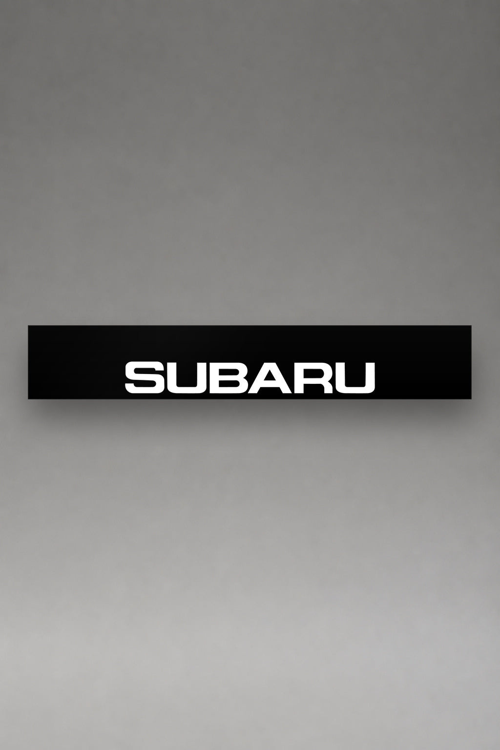 Parasol de vinilo Subaru · Identidad Contemporánea, la tira entera de 150 x 25 cm vista de frente, de MOA-Grafics.