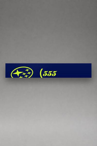 Parasol de vinilo Subaru 555 WRC · Edición Pléyades, la tira entera de 150 x 25 cm vista de frente, de MOA-Grafics.