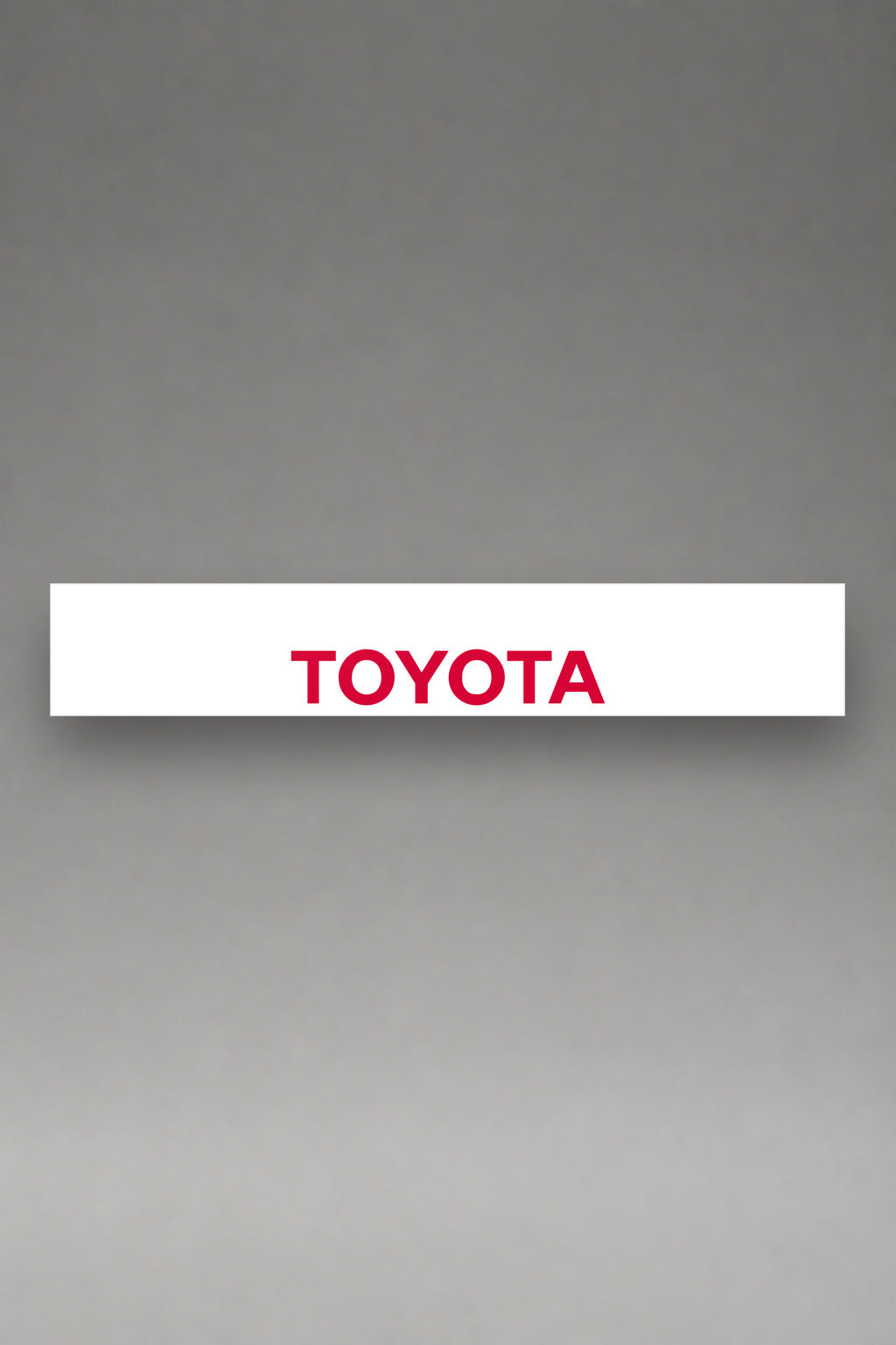 Parasol de vinilo Toyota · Emblema Tres Óvalos, la tira entera de 150 x 25 cm vista de frente, de MOA-Grafics.