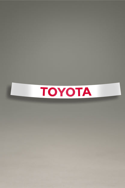 Parasol blanco para parabrisas con el logo de Toyota en rojo, una pieza de estilo JDM para la personalización y tuning de MOA-Grafics.