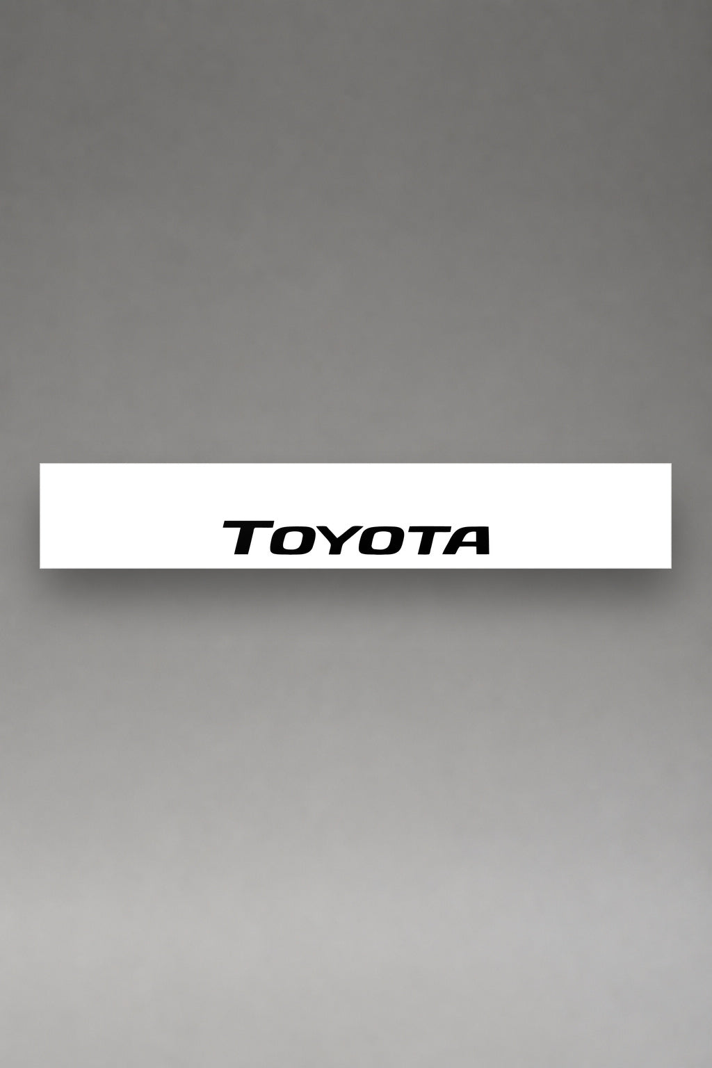 Parasol de vinilo Toyota · Lettering Clásico, la tira entera de 150 x 25 cm vista de frente, de MOA-Grafics.